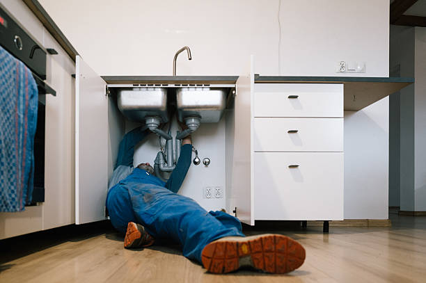 Professional Emergency Plumber technician working in Davis, CA